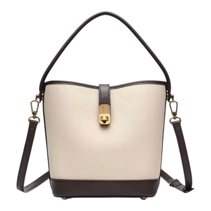 Beige handbag with brown accents on a white background