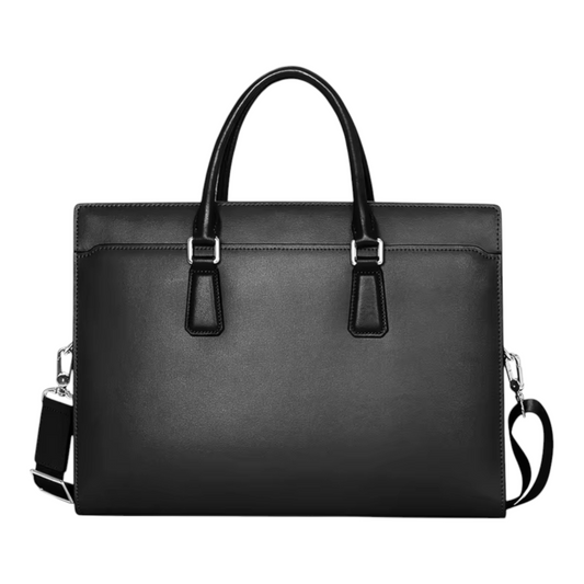 Front view of a black leather messenger bag with shoulder strap on a white background