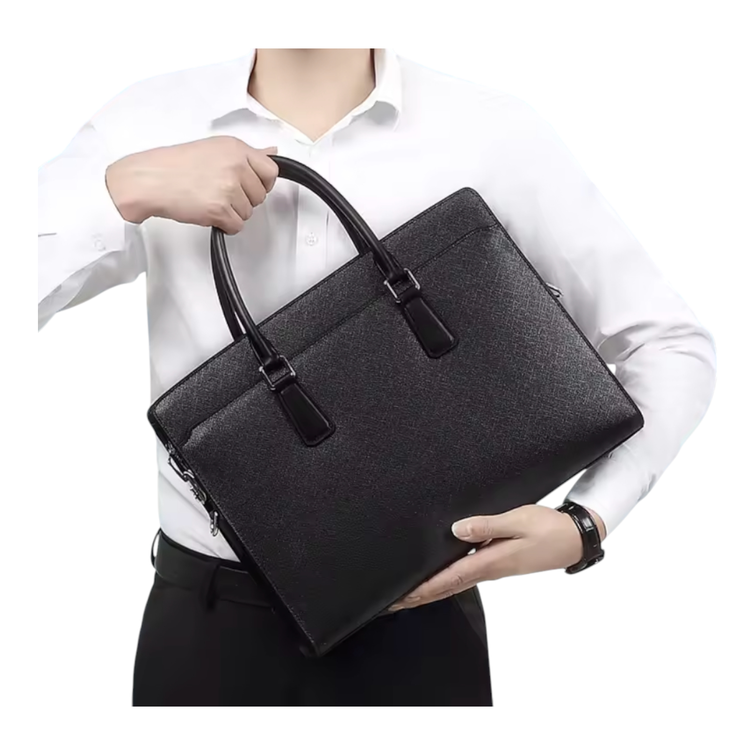 Person holding a black messenger bag against a white background