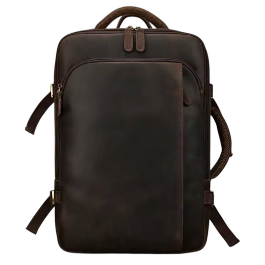 Brown leather backpack on a white background