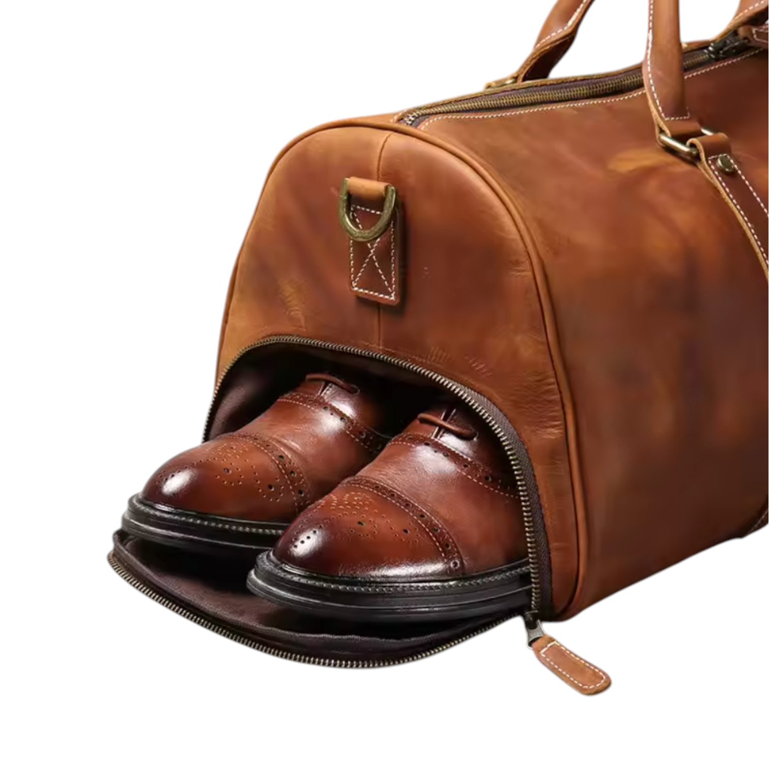Brown leather duffel bag with open top showing two brown shoes inside on a white background