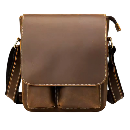 Brown leather sling bag on a white background