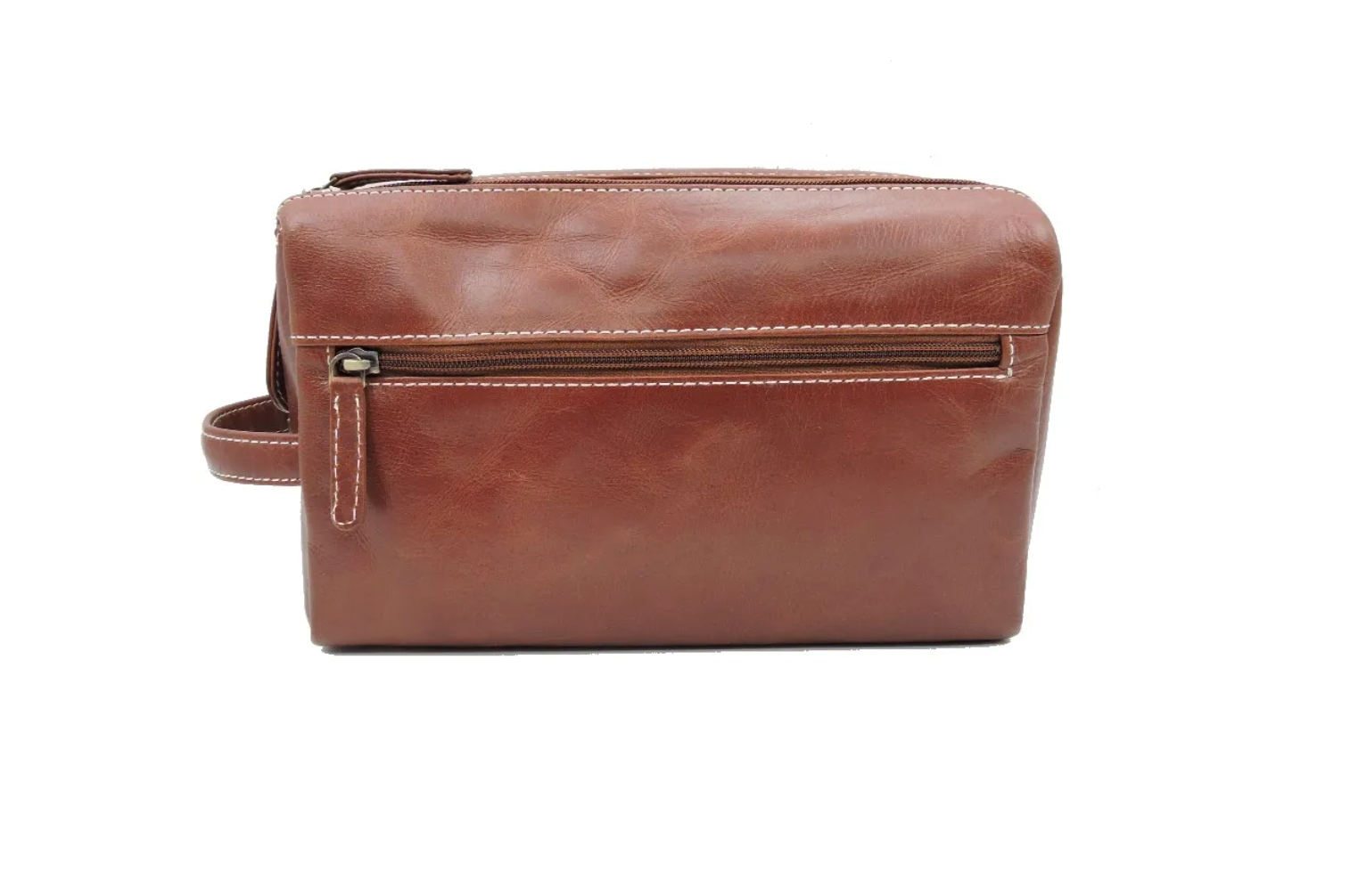 Back view of a brown leather toiletry bag on a white background