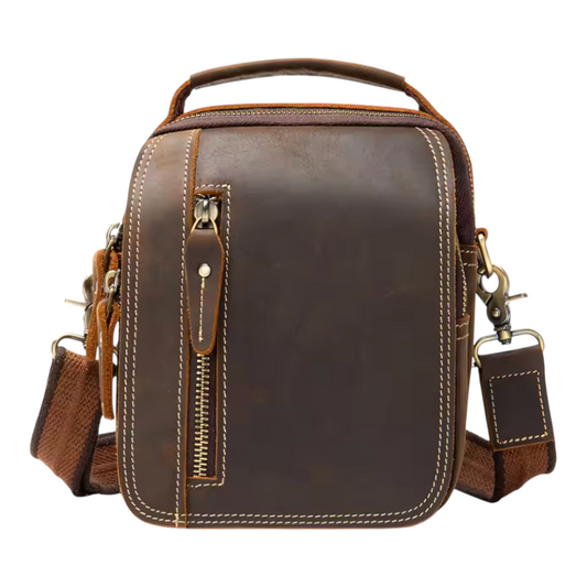 Brown leather crossbody bag on a white background