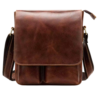 Dark brown leather sling bag on a white background