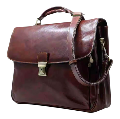 Brown leather messenger bag with a shoulder strap on a white background